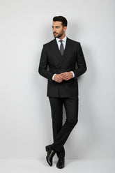Man in black pinstripe double-breasted suit with tailored fit and matching tie.
